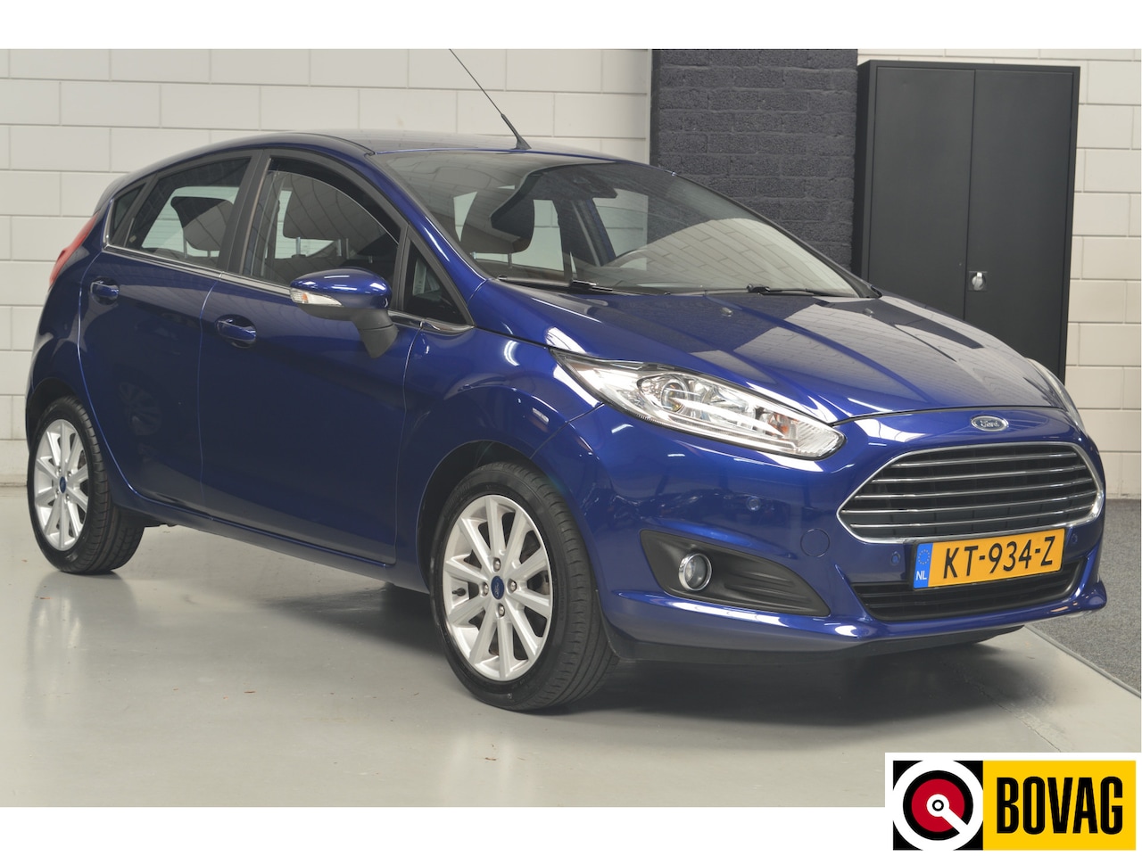 Ford Fiesta - 1.0 EcoBoost Titanium // 121.000 km // CLIMA // CRUISE // PDC // NAVI // 101 PK // - AutoWereld.nl