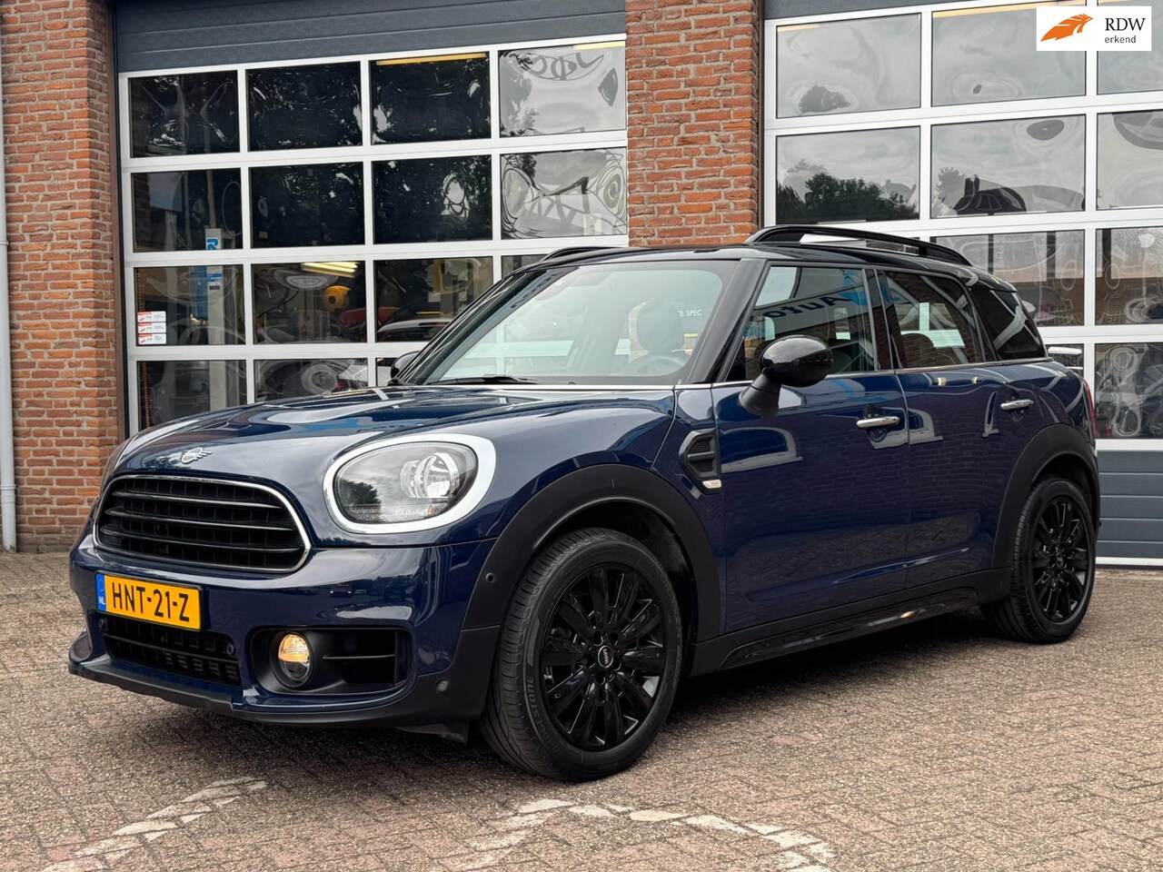 MINI Countryman - 1.5 Cooper Business Edition Mini 1.5 Cooper Business Edition, Navi, cruise, Sportleder,stoelverw. PDC, Airco, 18 inch - AutoWereld.nl