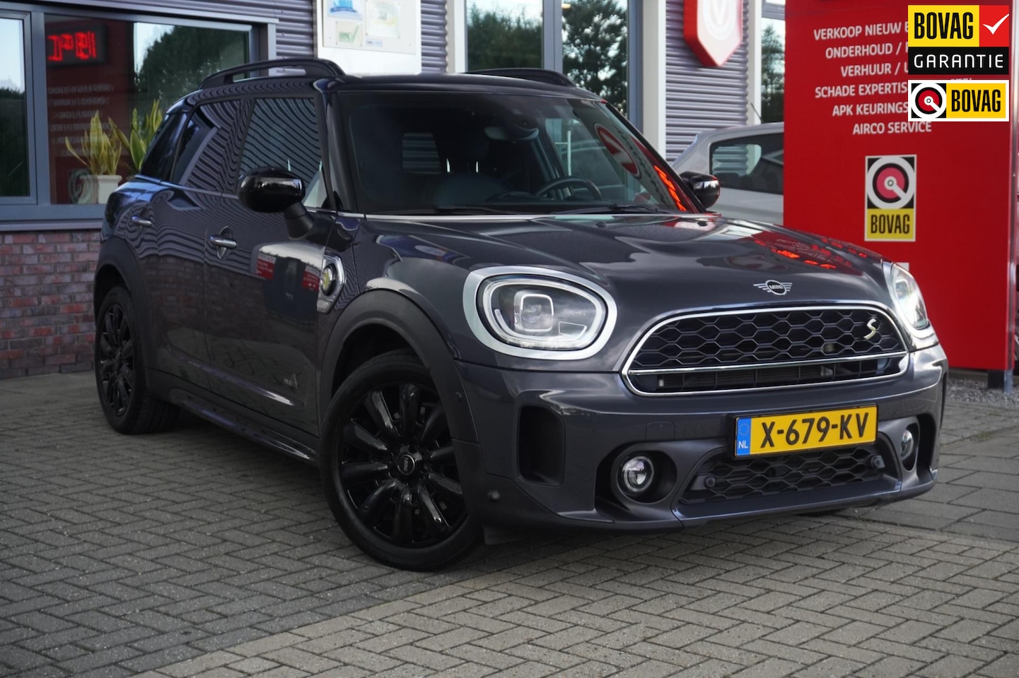 MINI Countryman - Mini 2.0 Cooper S E ALL4 / Stoelverwarming / Achteruitrijcamera - AutoWereld.nl