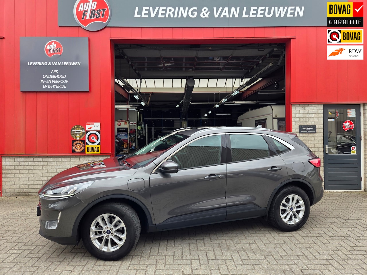 Ford Kuga - 2.5 PHEV Titanium Navigatie/ Camera/ Stoelverwarming/ Rijklaarprijs! - AutoWereld.nl