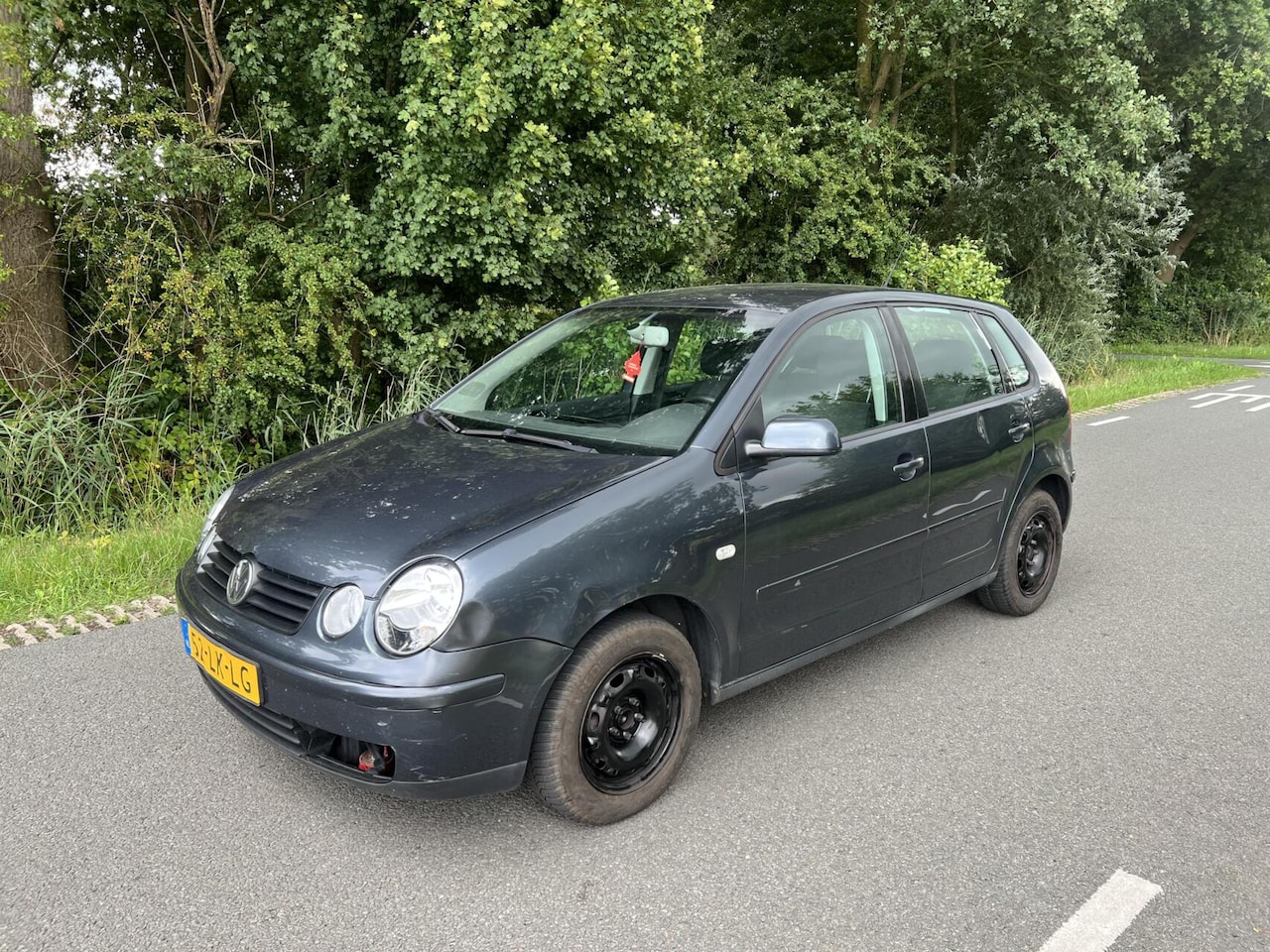 Volkswagen Polo - 1.4-16V Highline 1.4-16V Highline NIEUWE APK! - AutoWereld.nl
