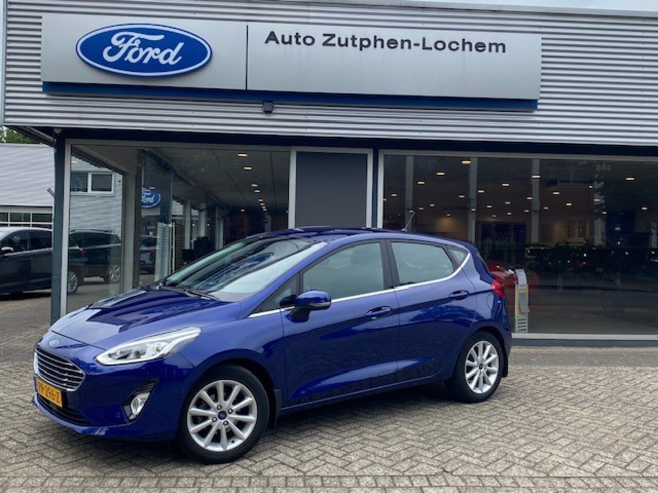 Ford Fiesta - 1.0 EcoBoost Titanium 100Pk 5dr 1e EIGENAAR | CAMERA | NAVI | VOORRUIT VERW | B&O AUDIO | - AutoWereld.nl