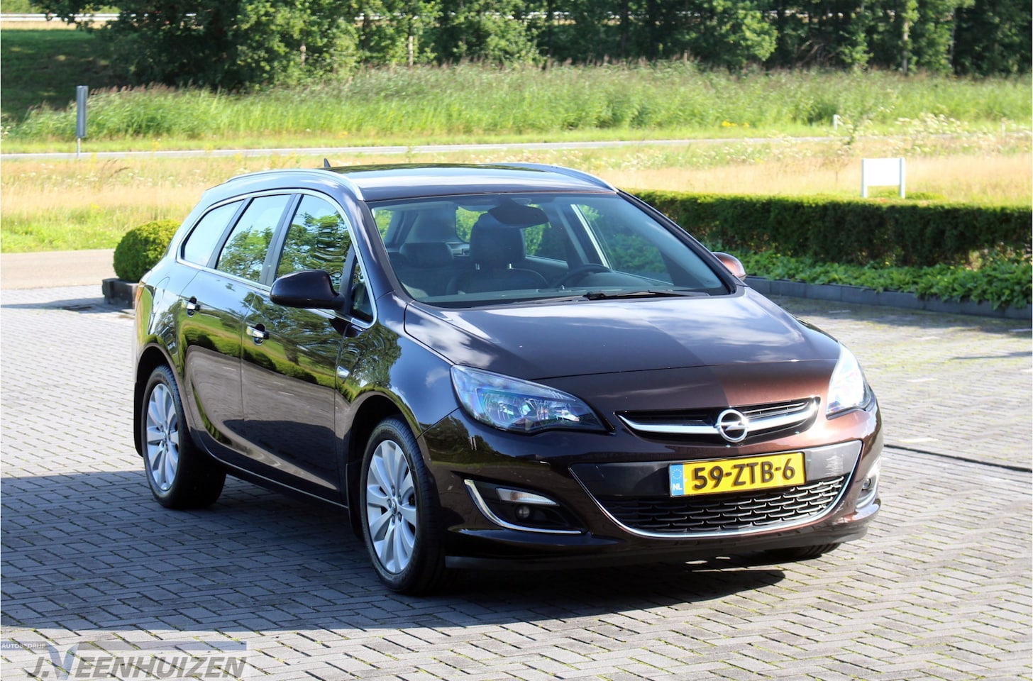 Opel Astra Sports Tourer - 1.4 Turbo Sport | 2013 | Navi | Cruise | - AutoWereld.nl