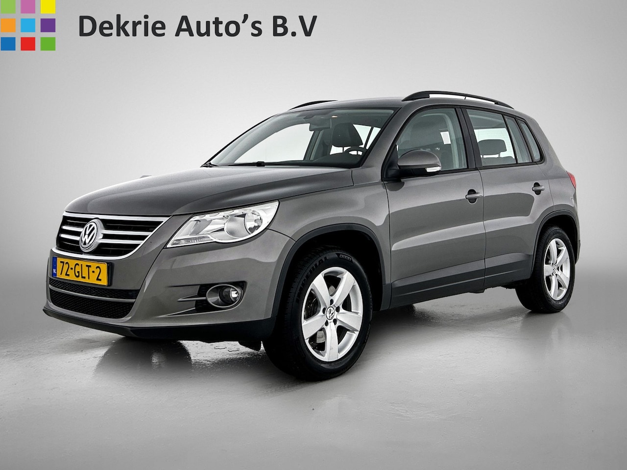 Volkswagen Tiguan - 2.0 TDI Comfort&Design 4Motion / Airco / Roofrail / Leder two-tone / Cruise-ctr. / Lm velg - AutoWereld.nl