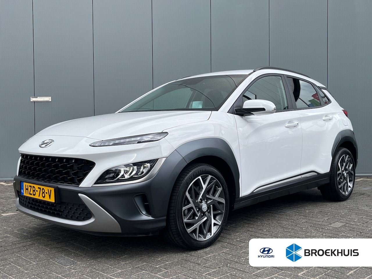 Hyundai Kona - 1.6 GDI HEV 140pk Fashion Design Automaat | Carplay | Camera | Climate | Keyless | Navigat - AutoWereld.nl