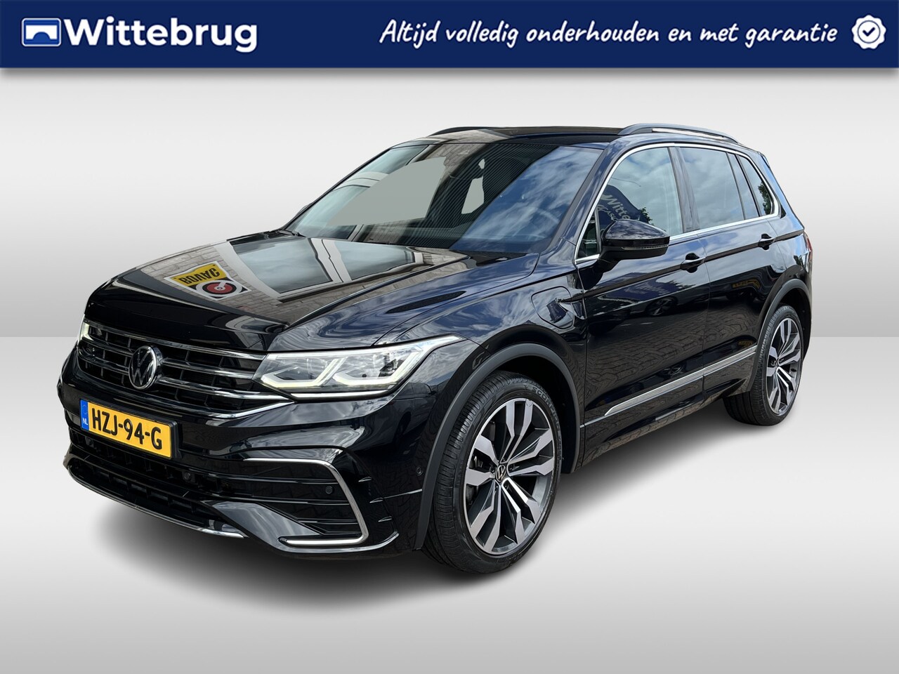 Volkswagen Tiguan - 1.4 TSI eHybrid R-Line / AUTOMAAT/ 245 PK/ ELEKTR. TREKHAAK/ 2X R-LINE/ RIJ-MODI/ DAB/ CLI - AutoWereld.nl