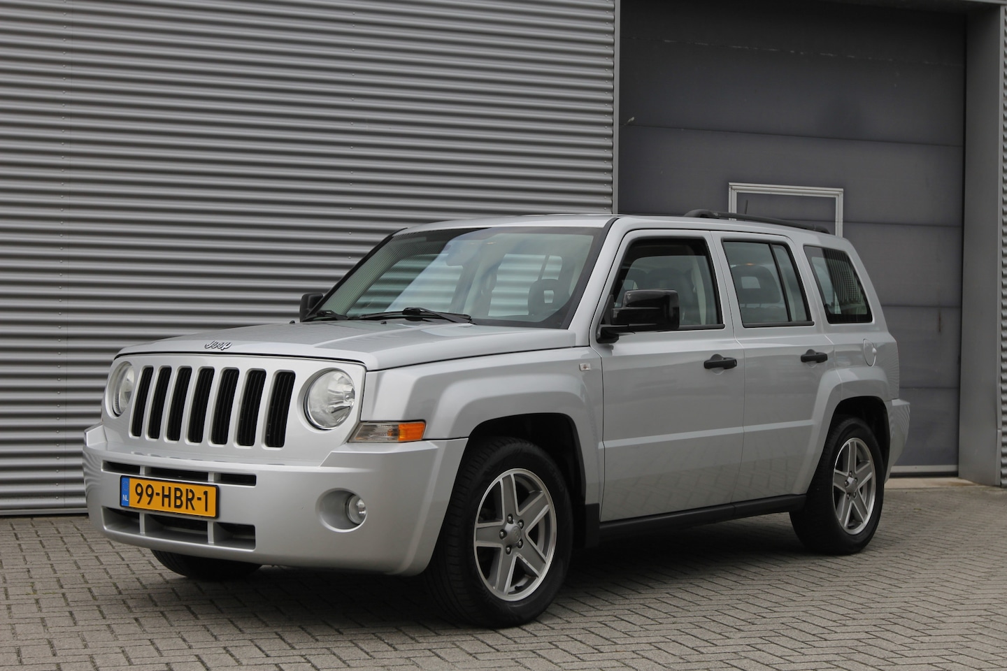 Jeep Patriot - 2.4 Sport Adventure I 4x4 I Airco I Nl. Auto - AutoWereld.nl