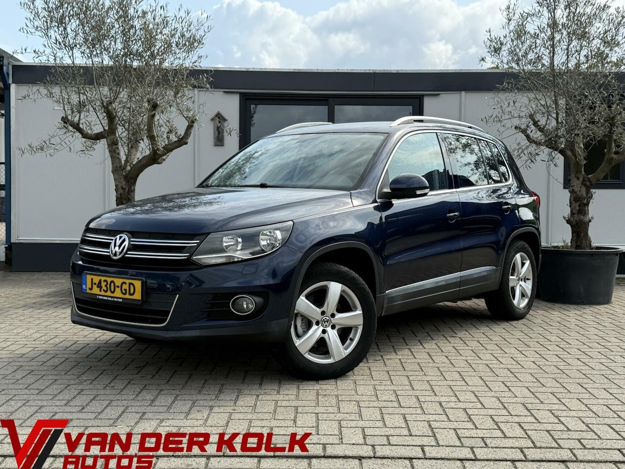 Volkswagen Tiguan - 1.4 TSI Sport&Style R-line Edition Carplay Navi Cruise Climate Trekhaak - AutoWereld.nl