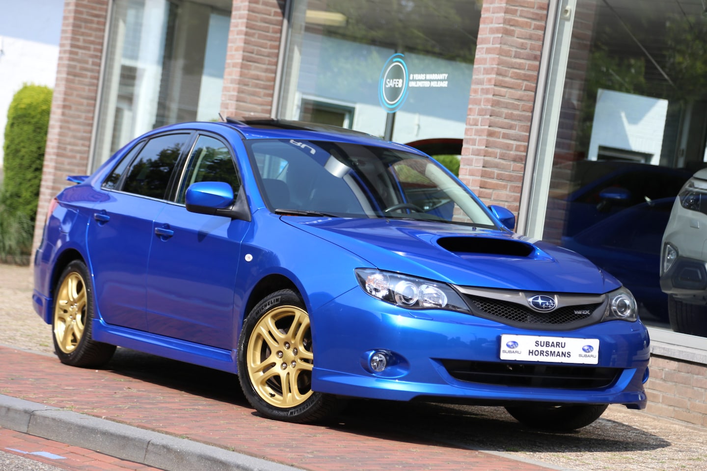 Subaru Impreza - 2.5 WRX Schuifdak Leer Navi Xenon - AutoWereld.nl