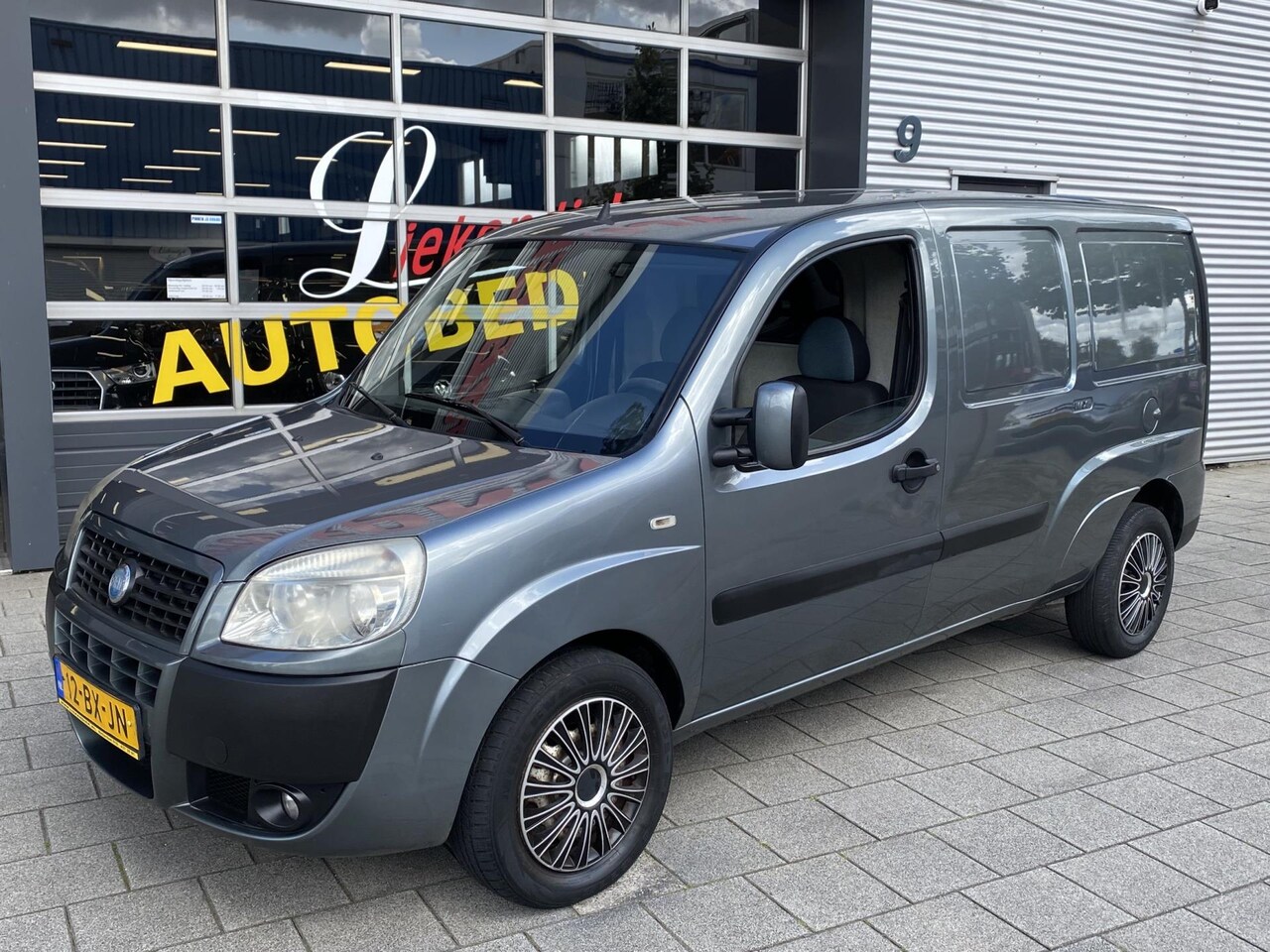 Fiat Doblò - 1.9 MultiJet SX Maxi - Airco I Cruise control I Comfort pakket I Trekhaak - AutoWereld.nl