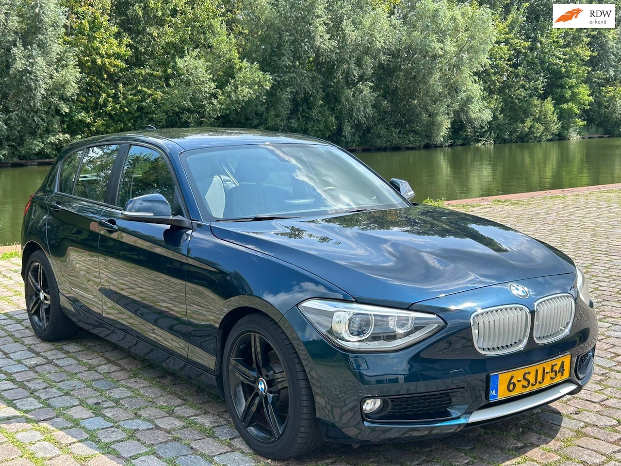 BMW 1-serie - 116i EDE Executive Zeer mooi auto navigatie cruis control navigatie elektrische ramen cv o - AutoWereld.nl