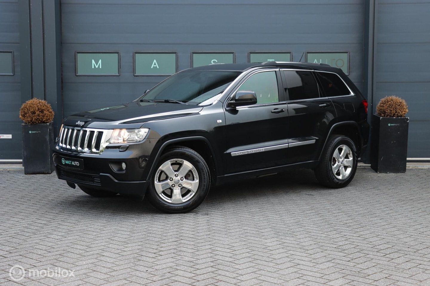 Jeep Grand Cherokee - 3.0 CRD Laredo | NAP | Leder | Trekhaak - AutoWereld.nl