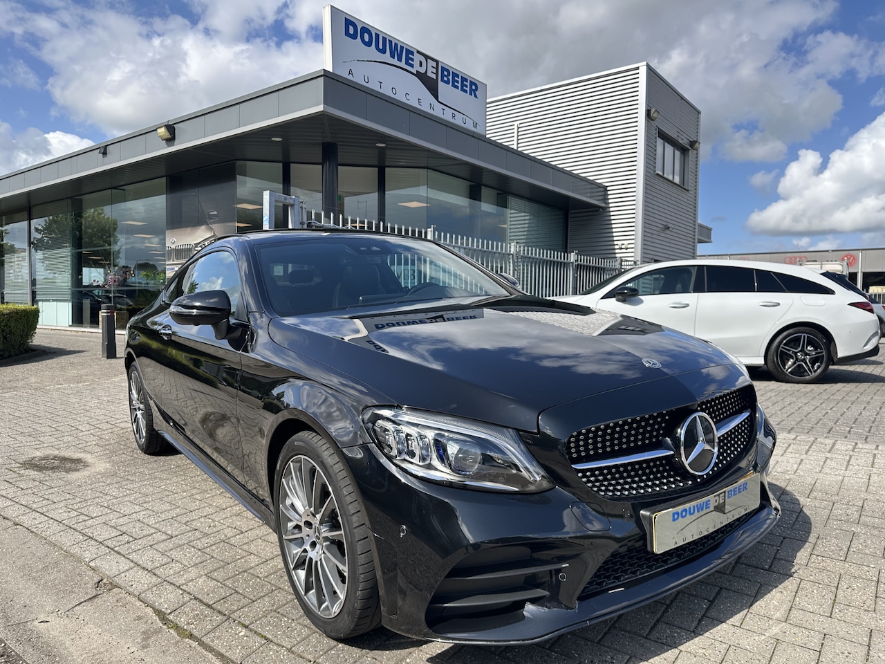 Mercedes-Benz C-klasse Coupé - 180 AMG Line Night Pano-Dak | Keyless | Burmester | Stoelverw. - AutoWereld.nl