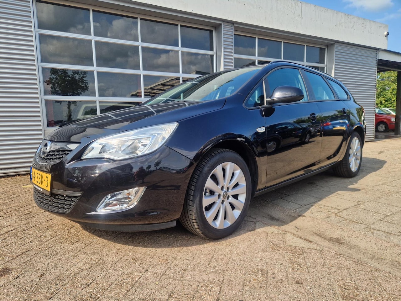 Opel Astra Sports Tourer - 1.4 Turbo Sport 1.4 Turbo Sport - AutoWereld.nl
