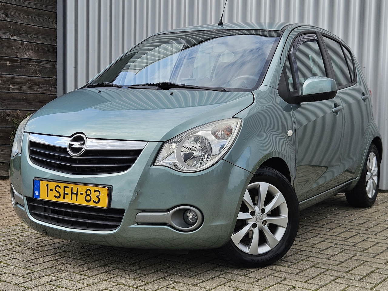 Opel Agila - 1.0 Edition /Airco/PDC/Navi/LMV/90.619km NAP! - AutoWereld.nl