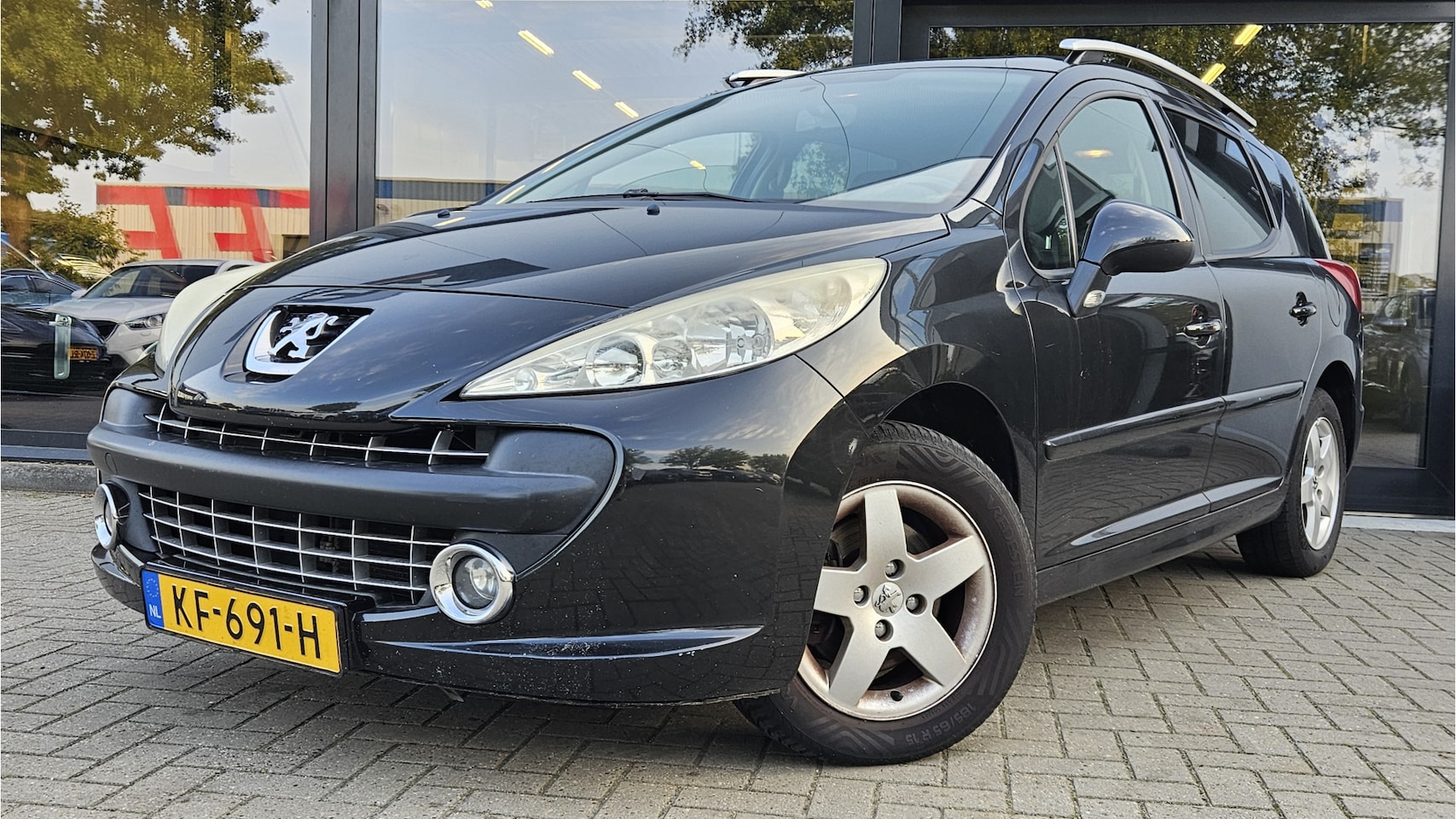 Peugeot 207 SW - 1.4 VTi X-line + LEER + PANO DAK + AIRCO + LM VELGEN - AutoWereld.nl