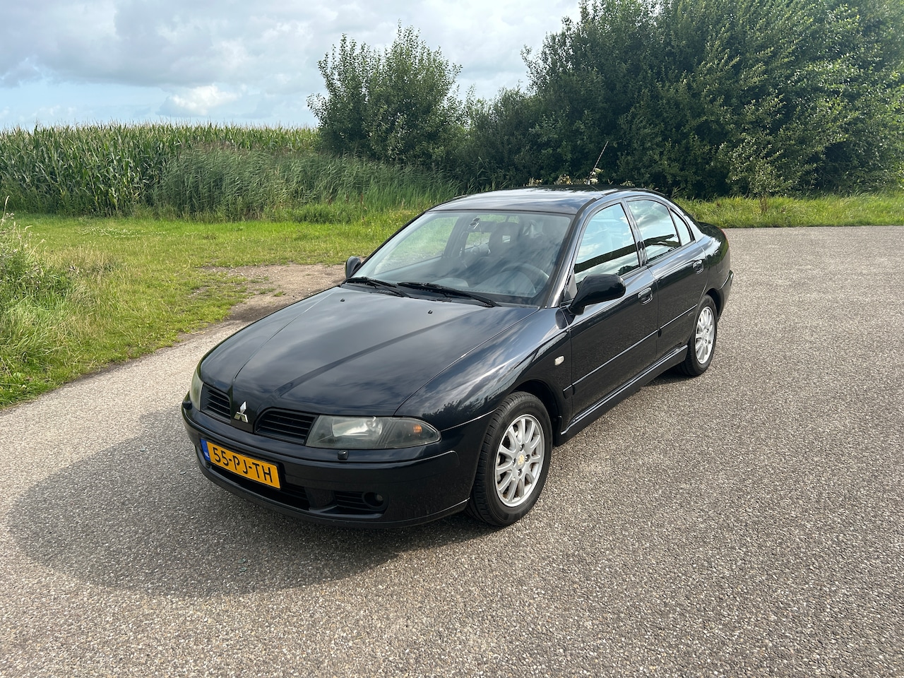 Mitsubishi Carisma - 1.6 Platinum Edition - AutoWereld.nl