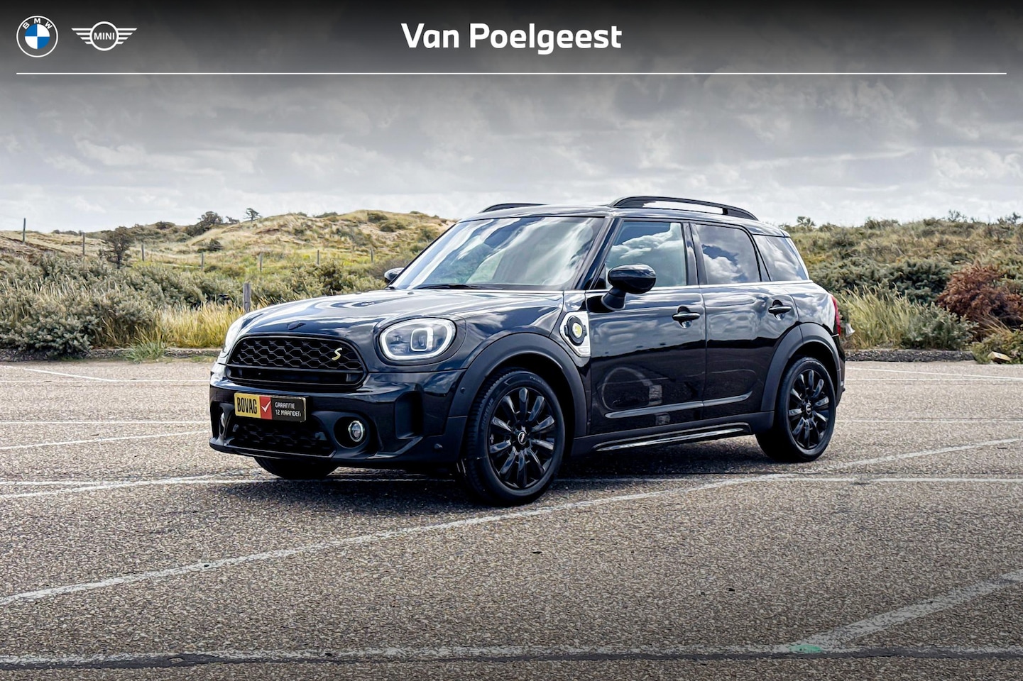 MINI Countryman - Cooper S E ALL4 Classic | Glazen Panoramadak | Stoelverwarming | Head-up Display | Achteru - AutoWereld.nl