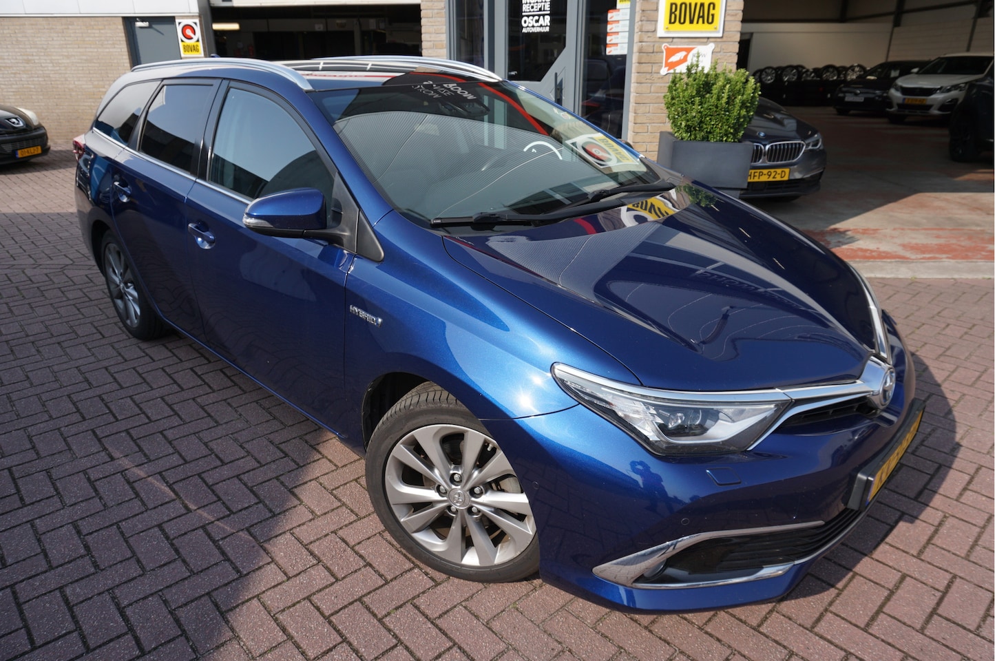 Toyota Auris Touring Sports - 1.8I Hybrid Lease Pro Automaat - AutoWereld.nl