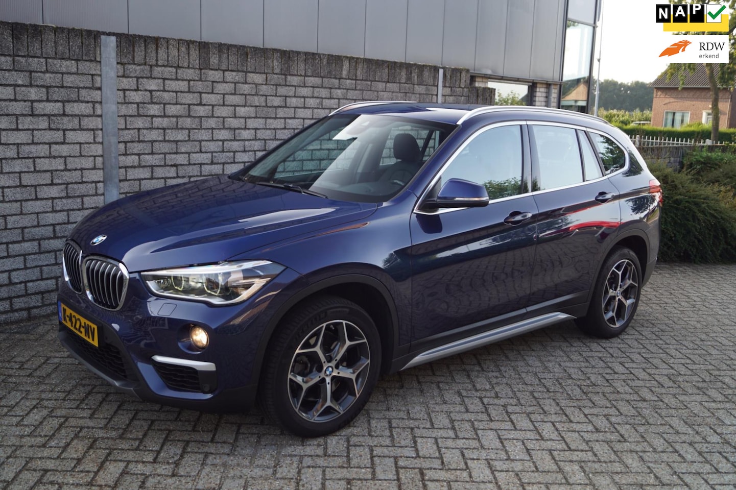 BMW X1 - SDrive20i High Executive Autom 192 PK Leder Stoelverw Navi Camera Clima Cruise Botswaarsch - AutoWereld.nl