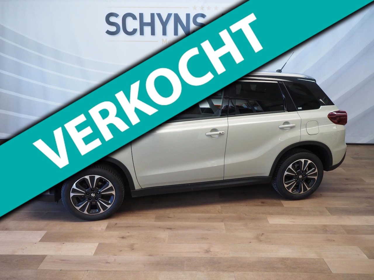 Suzuki Vitara - 1.4 hybride comfort + beige/stoelverw./achteruitrijcam./lane control/brake support/cruise - AutoWereld.nl