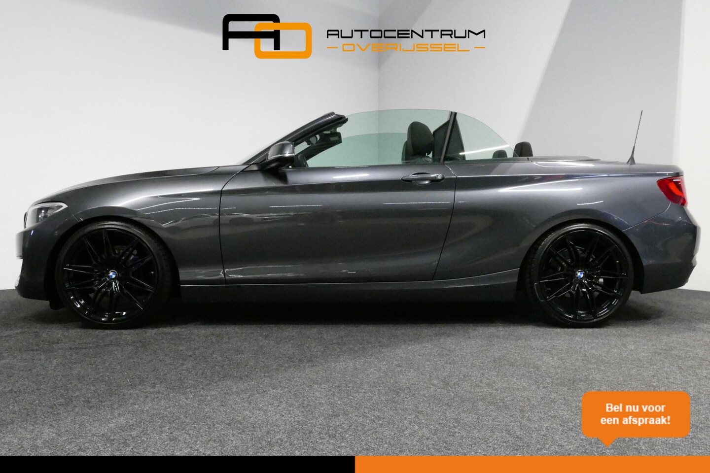 BMW 2-serie Cabrio - 218i Essential / Stoelverwarming / Windscherm / Climatronic / 19'' LMV / Parkeersensoren a - AutoWereld.nl