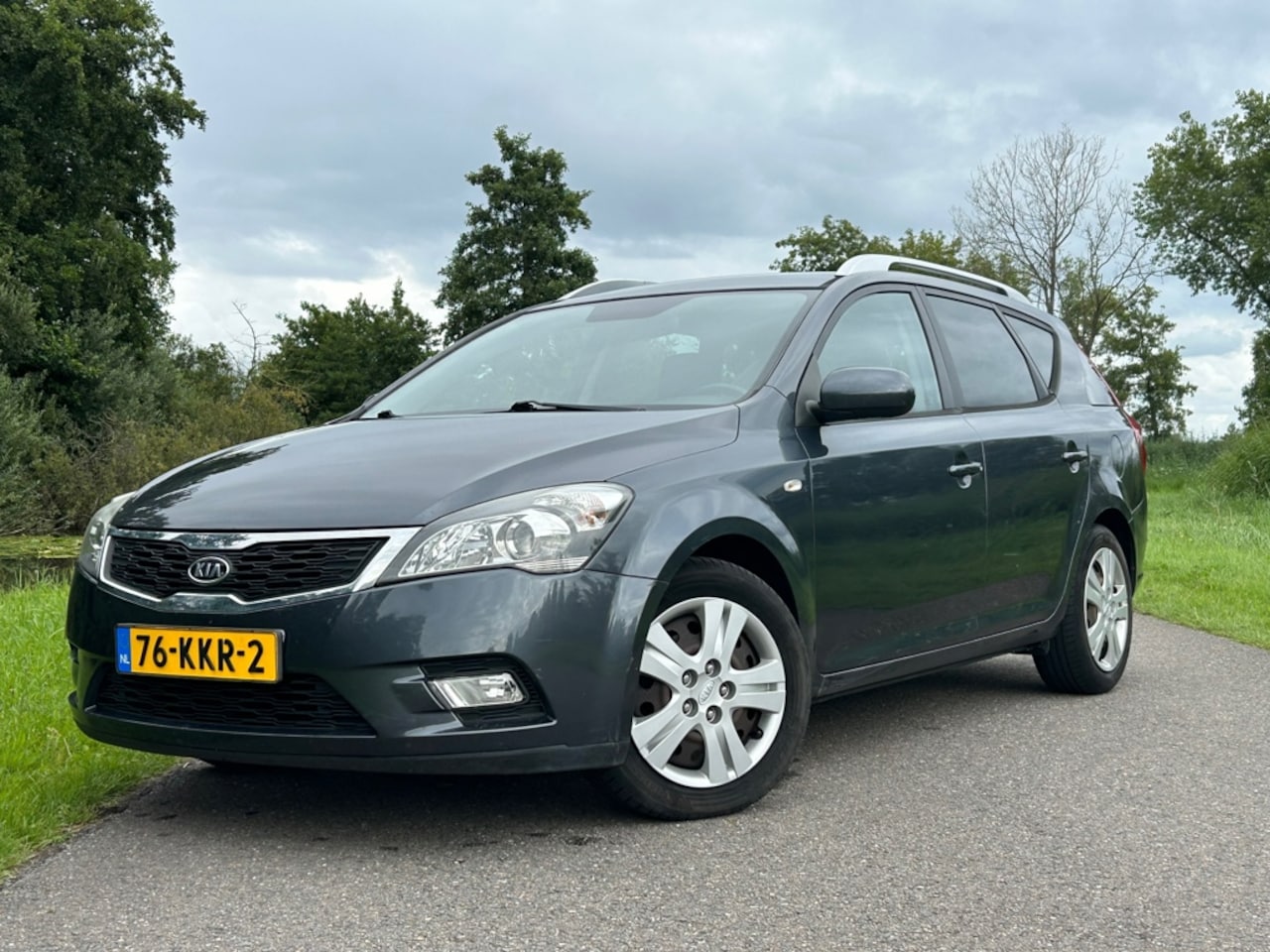 Kia Cee'd Sporty Wagon - 1.4 CVVT X-ecutive | Clima | Airco | Trekhaak | - AutoWereld.nl