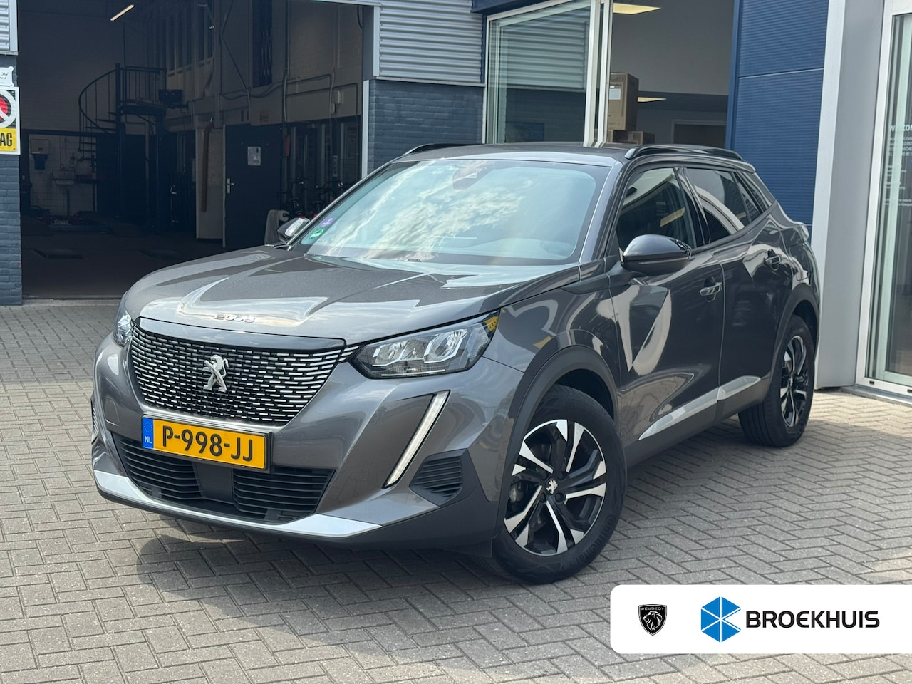Peugeot 2008 - 1.2 PureTech Allure Pack | Trekhaak | Clima | Cruise | Apple Carplay/Android Auto | 17'' L - AutoWereld.nl
