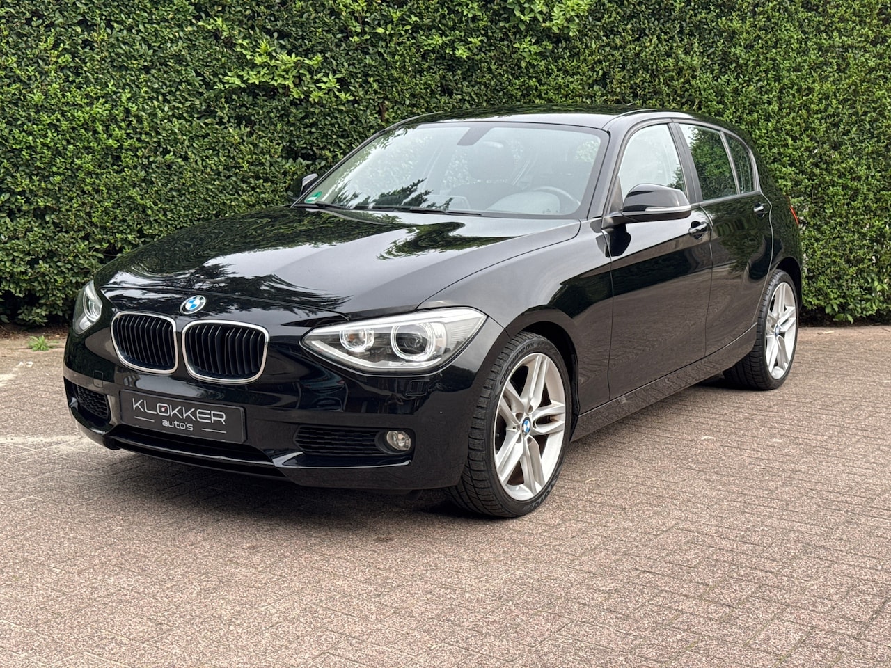 BMW 1-serie - 118i High Executive Xenon | Navigatie | Clima - AutoWereld.nl