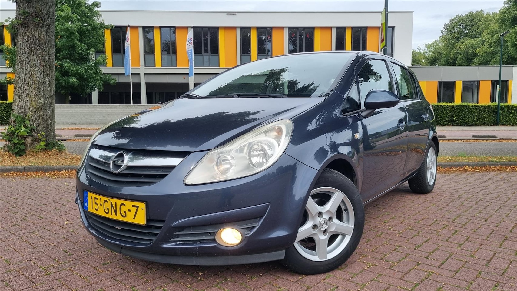 Opel Corsa - 1.4 5drs Enjoy Airco/ Cruise/ Trekhaak nwe APK!! - AutoWereld.nl