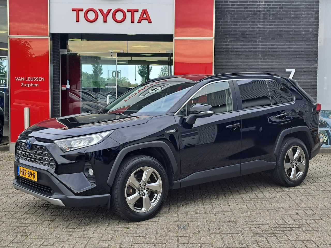 Toyota RAV4 - 2.5 Hybrid AWD Executive LEDEREN BEKLEDING STOELVERWARMING ELEKTRISCHE ACHTERKLEP TREKHAAK - AutoWereld.nl