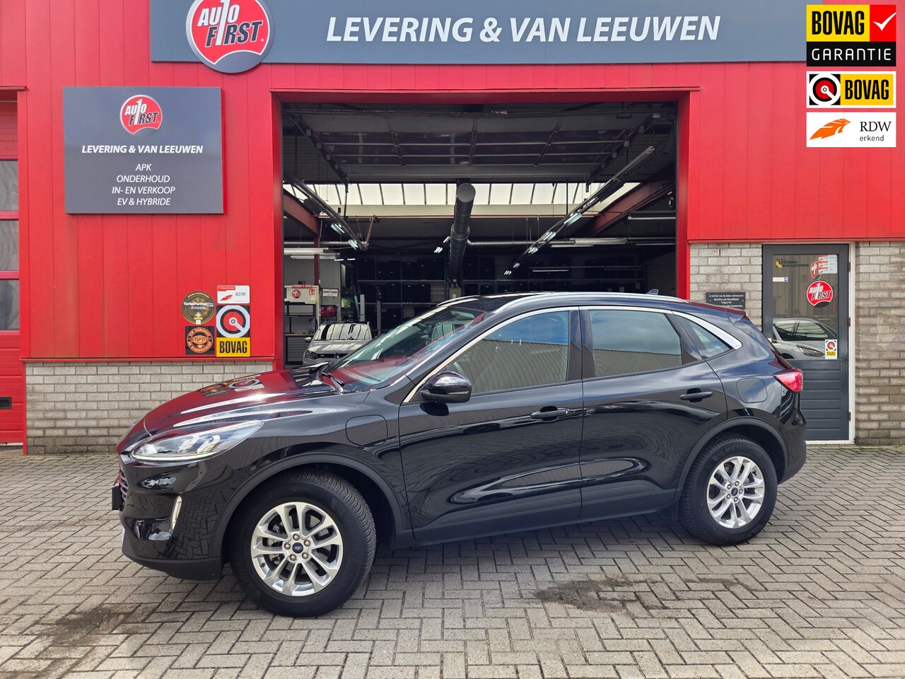 Ford Kuga - 2.5 PHEV Titanium Navigatie/ Camera/ Stoelverwarming/ Rijklaarprijs! - AutoWereld.nl