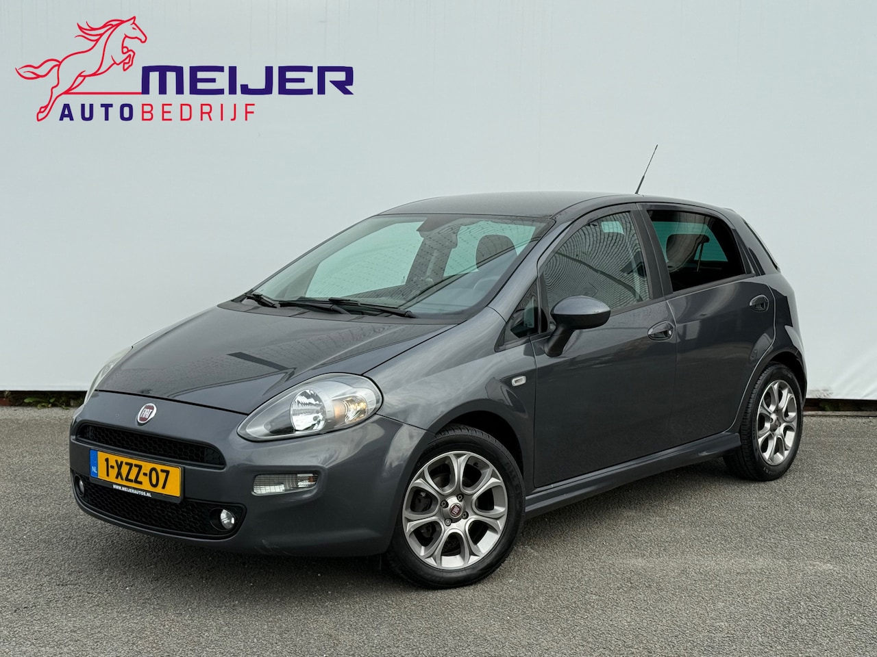 Fiat Punto Evo - 1.3 M-Jet Lounge Sportvelgen | 5 deurs | Cruise | Clima | Trekhaak | Parkeersensoren !! - AutoWereld.nl