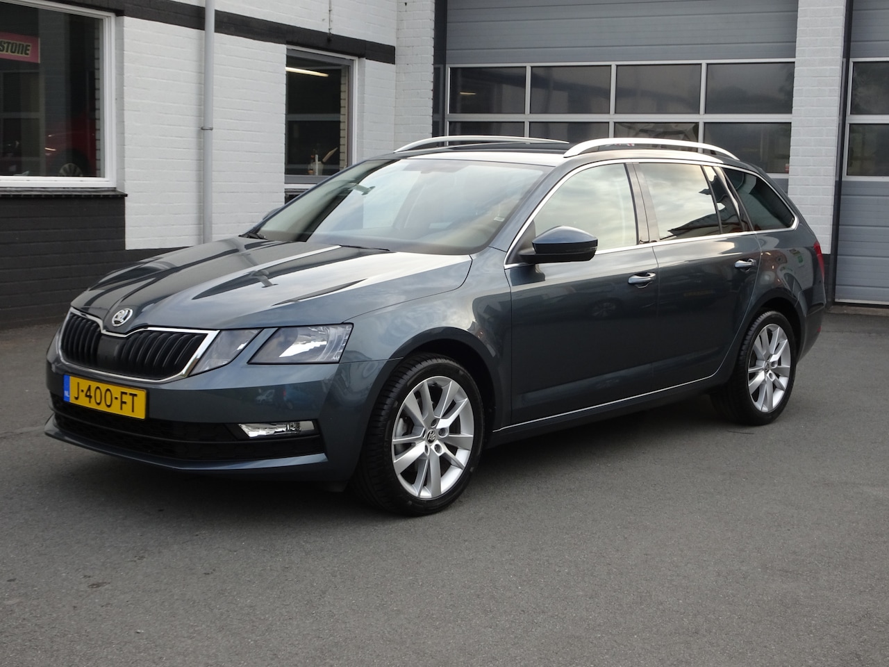 Skoda Octavia Combi - 1.5 TSI Greentech Business Edition Automatische airco, navigatie, stoelverwarming, cruise - AutoWereld.nl