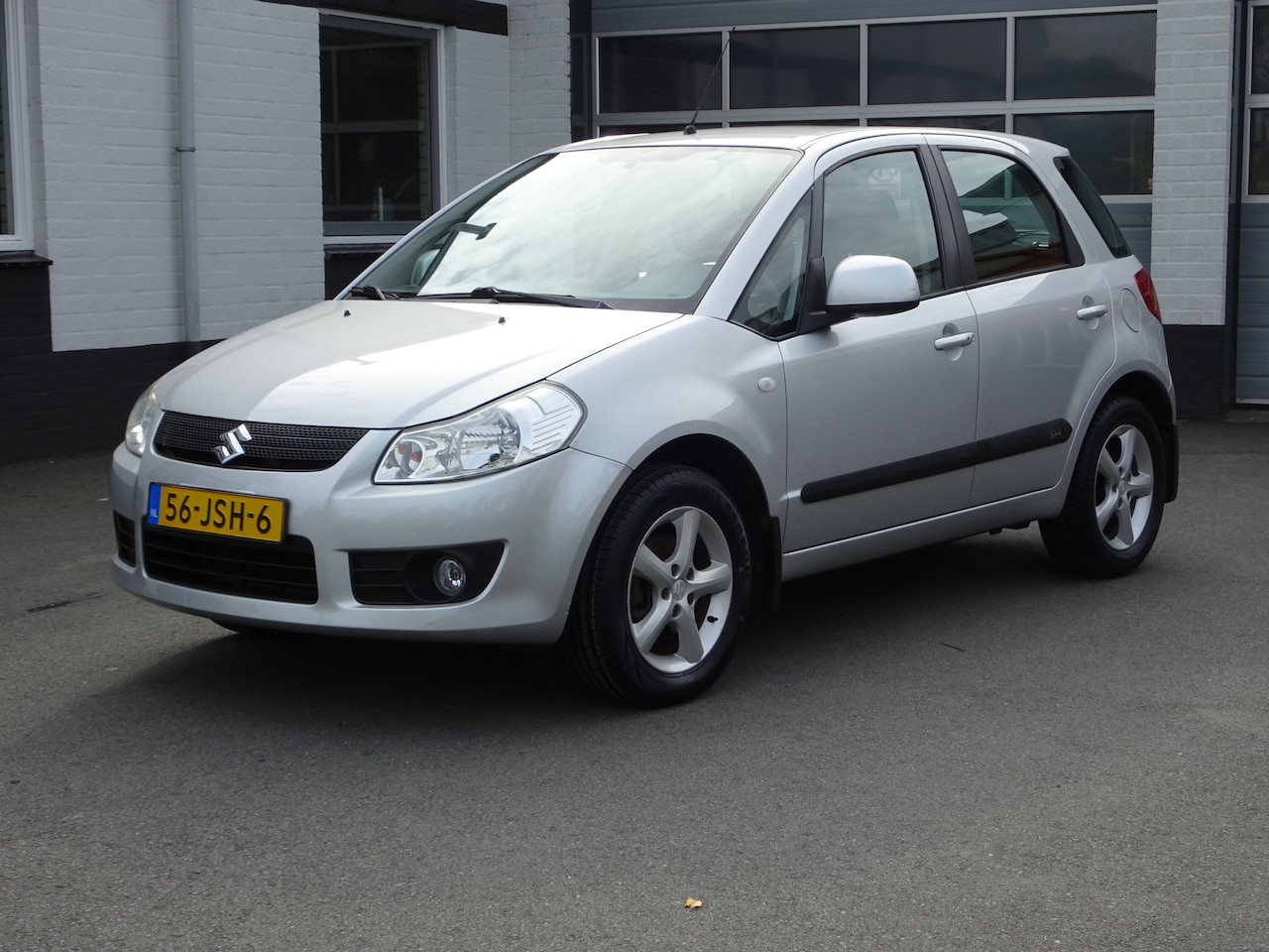 Suzuki SX4 - 1.6 Exclusive Automatische airco, trekhaak, licht metalen velgen, enz. - AutoWereld.nl