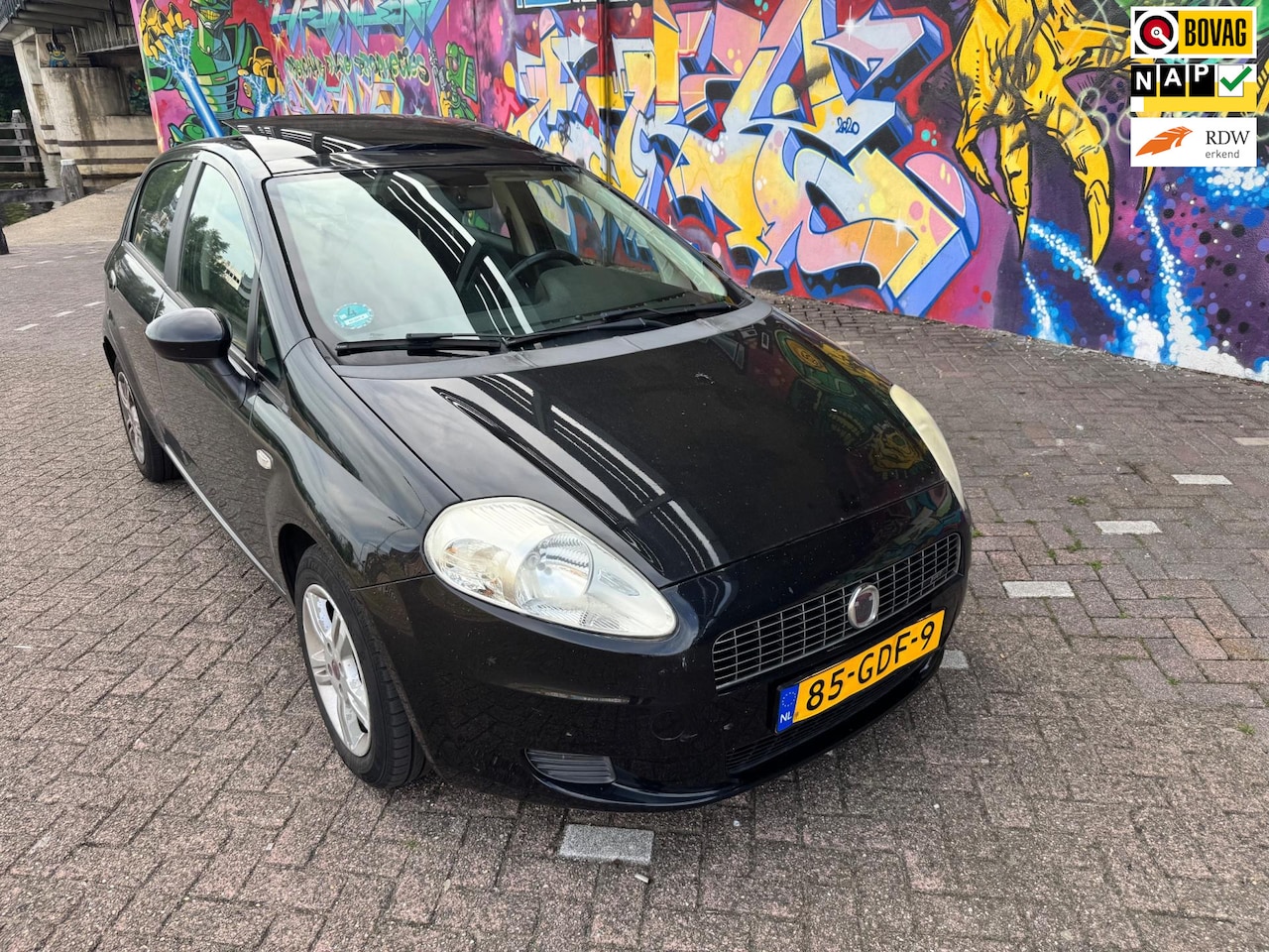 Fiat Grande Punto - 1.4-16V Ed. Lusso panoramadak airco sport velgen rijd perfect zeer leuke auto leuke km sta - AutoWereld.nl