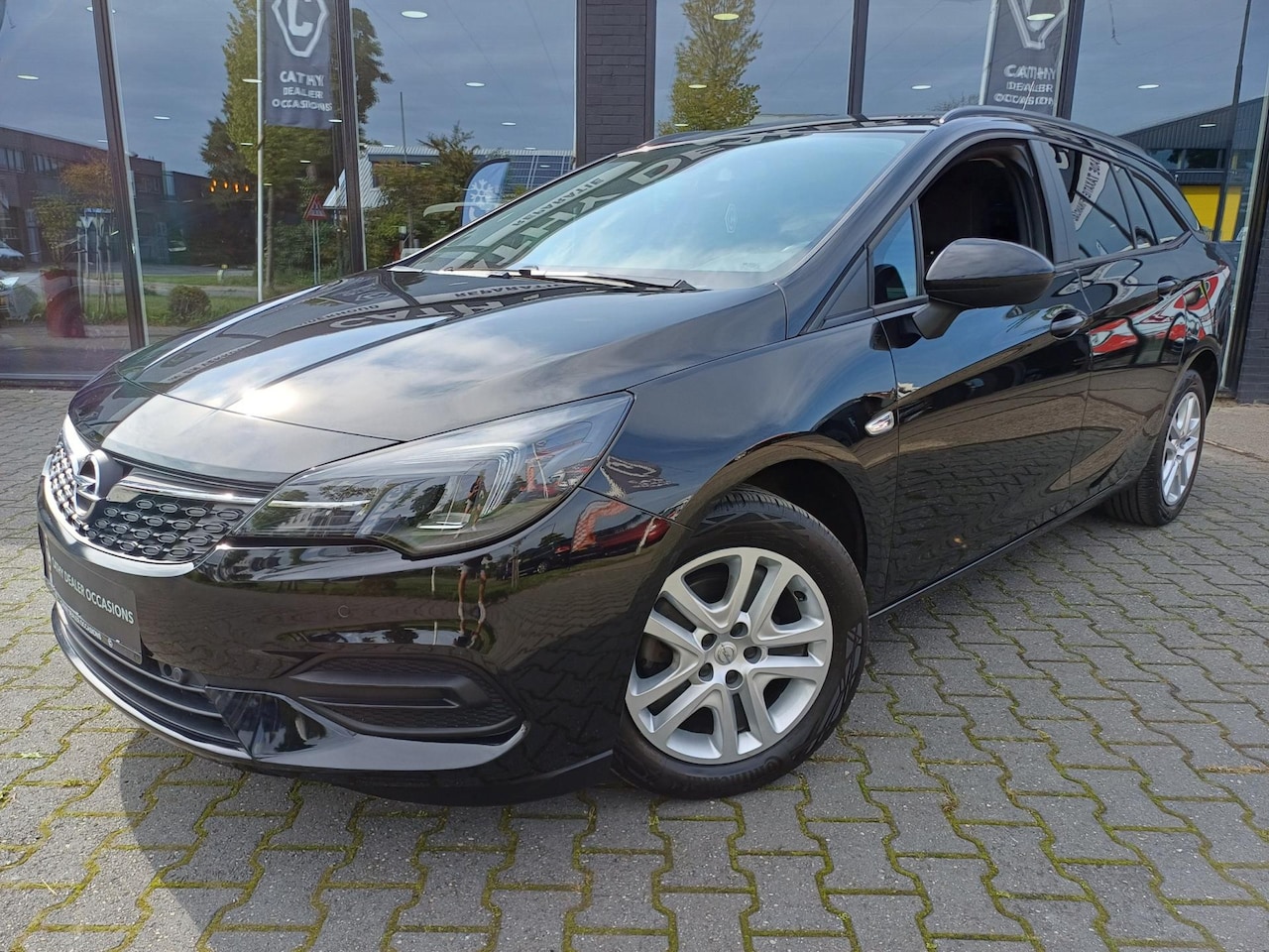 Opel Astra Sports Tourer - 1.2 Business Edition Climate Cruise Apple Carplay Stoel+stoelverwarming - AutoWereld.nl