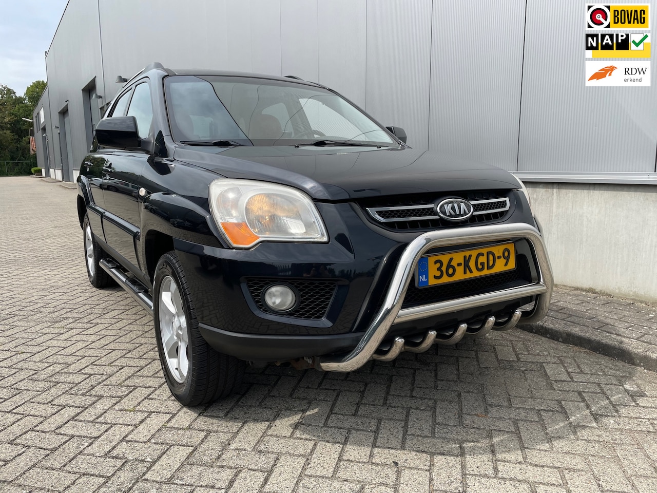 Kia Sportage - 2.0 CVVT Fifteen / open dak - AutoWereld.nl