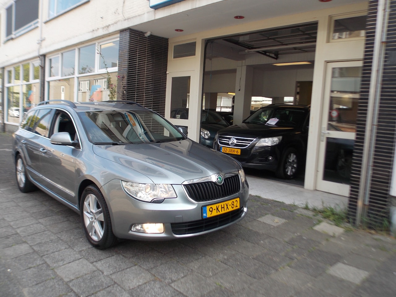Skoda Superb Combi - 1.8 TSI Ambition NAVI CRUISE CONTROL PDC AUTOMAAT - AutoWereld.nl
