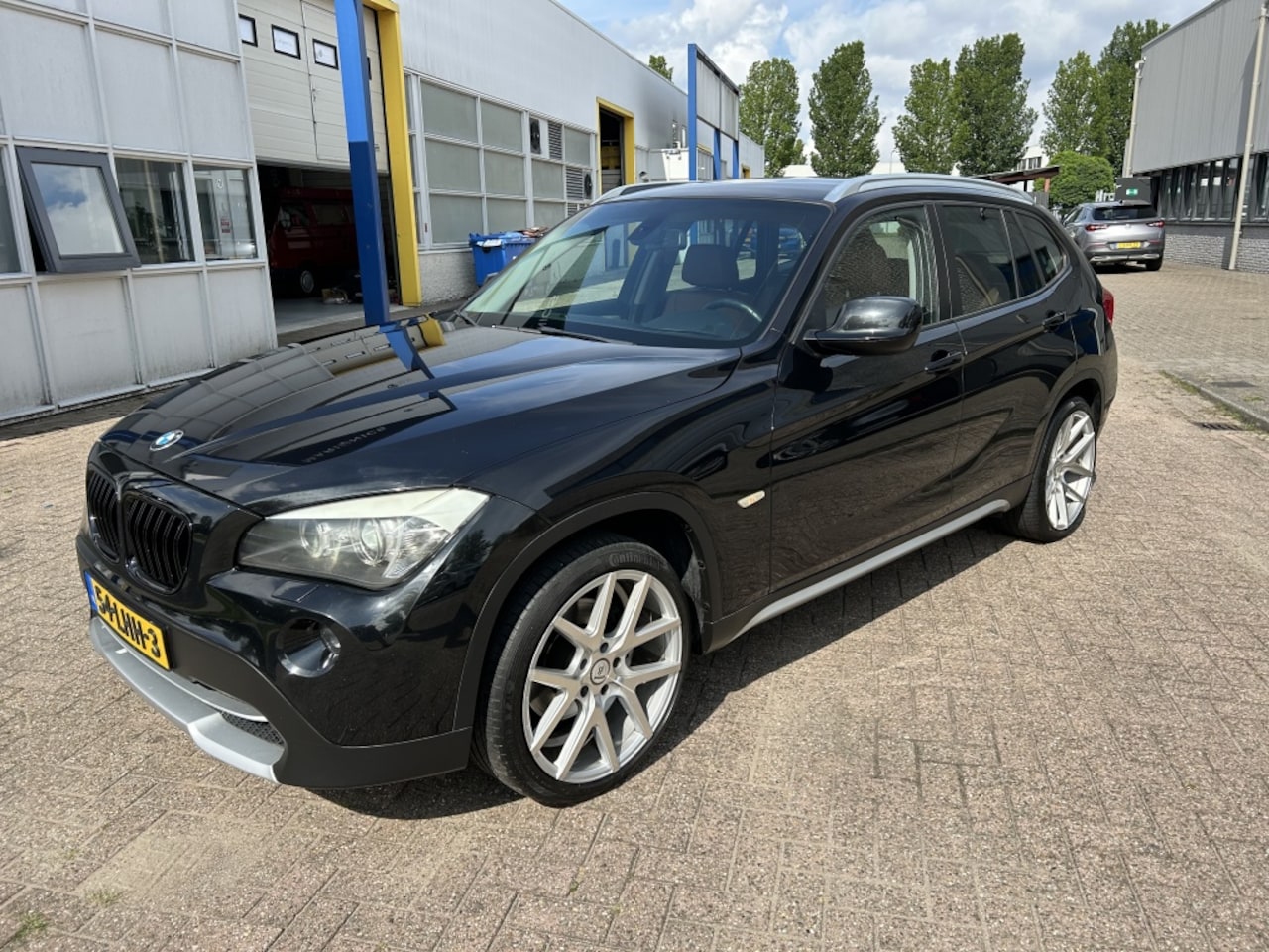 BMW X1 - sDrive18i Exec. LEER STOELVW XENON PDC NAP! - AutoWereld.nl