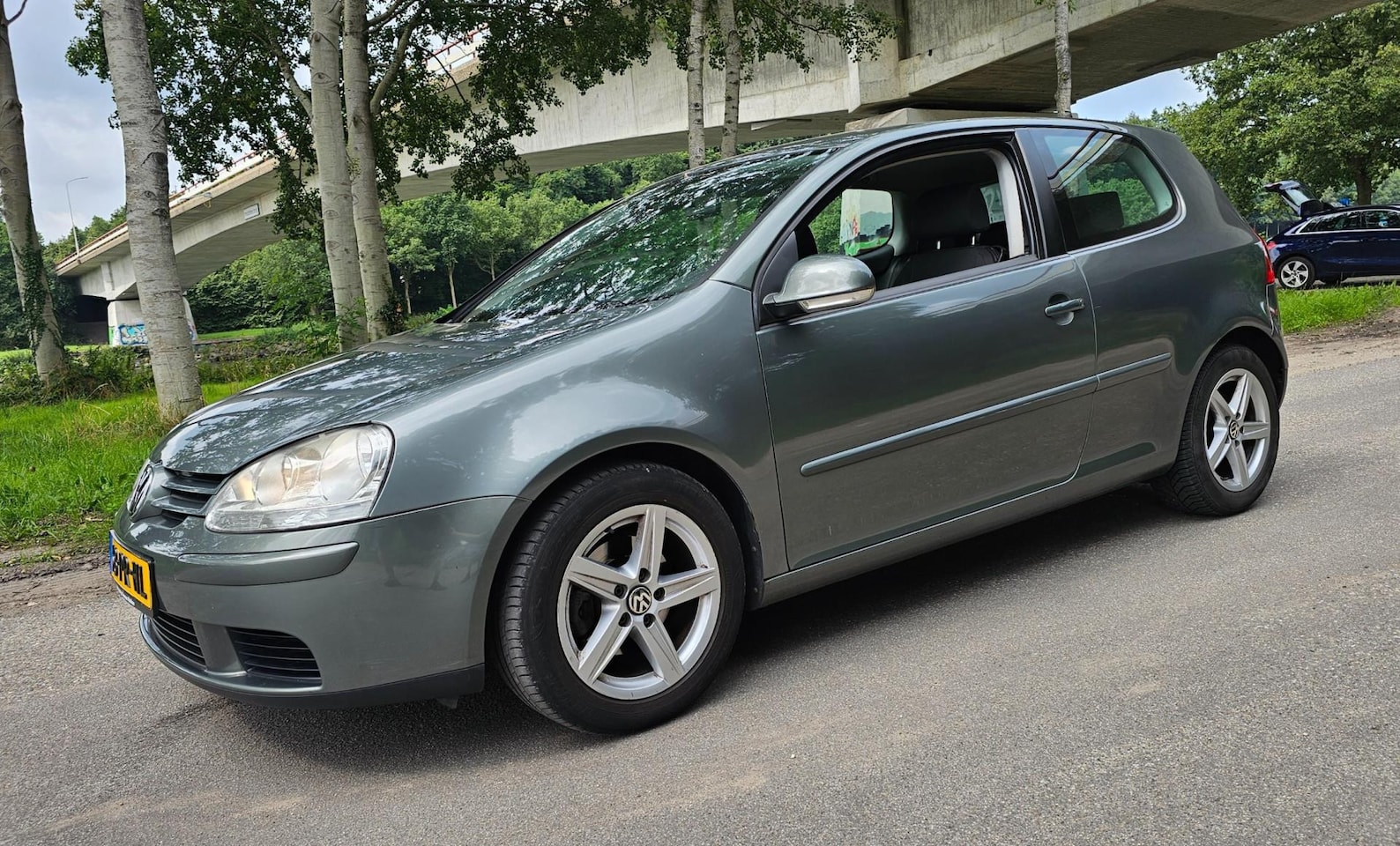 Volkswagen Golf - 1.4 FSI Sportline Climate Control Navigatie - AutoWereld.nl
