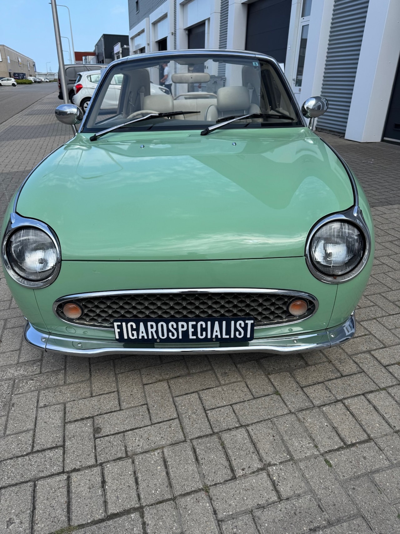 Nissan Figaro - 715 Emerald Groen, Automaat, airco, turbo - AutoWereld.nl