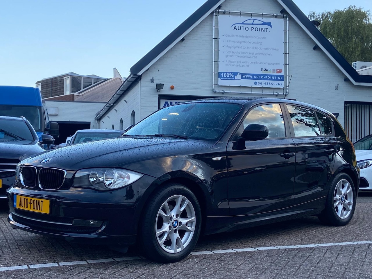 BMW 1-serie - 116i AUT/STOEL+STUUR VERW/PDC/CRUISE - AutoWereld.nl