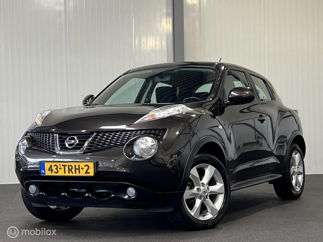 Nissan Juke - 1.6 Acenta Eco [ NAP trekhaak cruise clima ] - AutoWereld.nl
