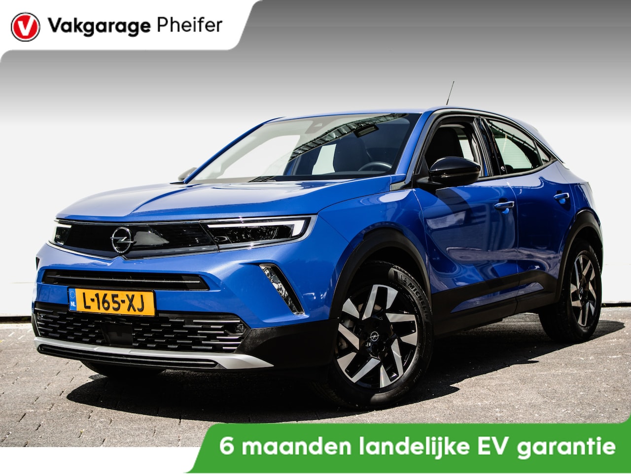 Opel Mokka-e - Elegance 50-kWh 11kw bl. Carplay/ Stoel-stuurverwarming/ Camera/ Led/ Navigatie/ Cruise co - AutoWereld.nl