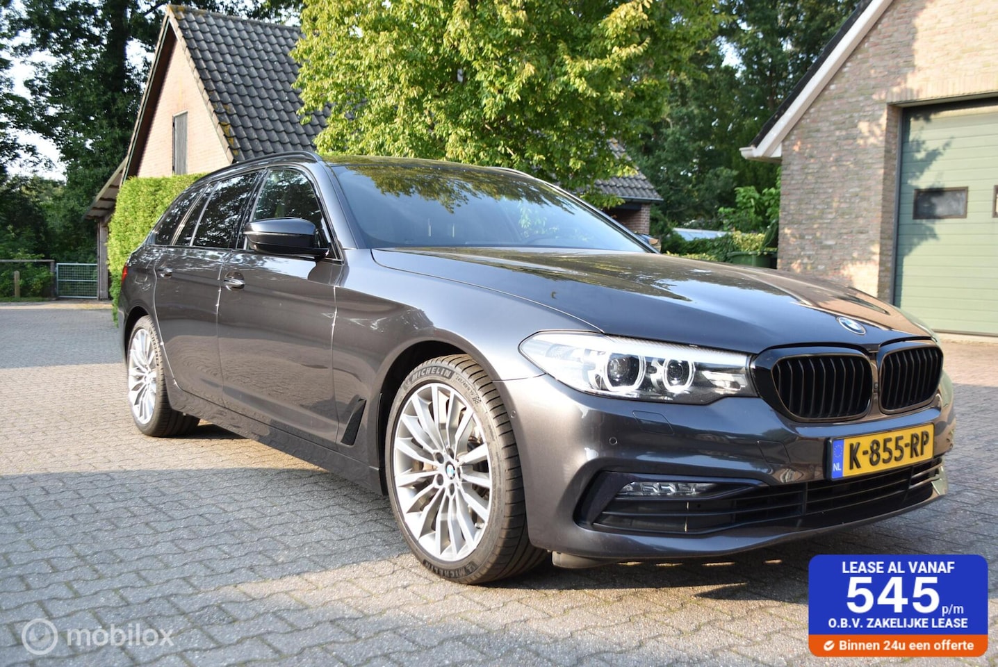 BMW 5-serie Touring - 540i xDrive High Executive Sportline - AutoWereld.nl