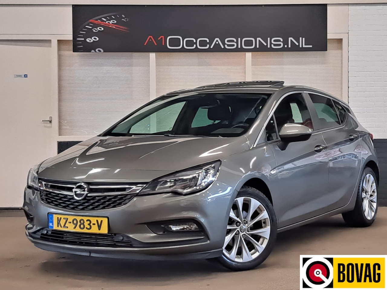 Opel Astra - 1.4 Business+ + NAVI + SCHUIFDAK ! - AutoWereld.nl