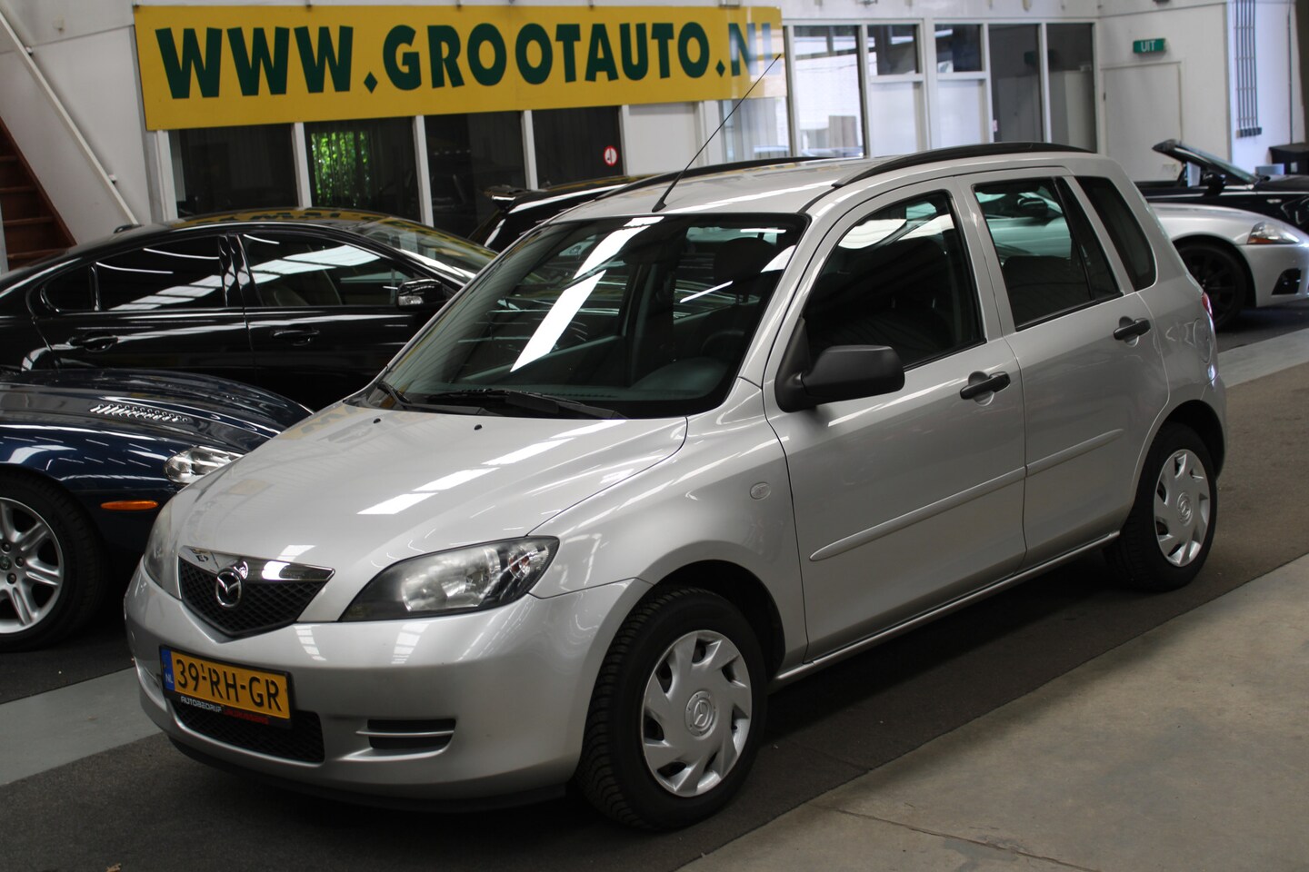 Mazda 2 - 1.4 Exclusive NAP, Airco, Trekhaak, Stuurbekrachtiging - AutoWereld.nl