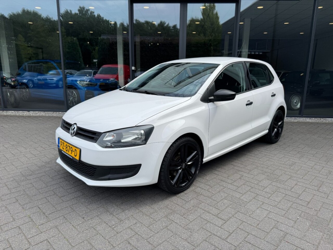 Volkswagen Polo - 1.2 EasyLine Sport,Airco,Cruise,Navi,Camera - AutoWereld.nl