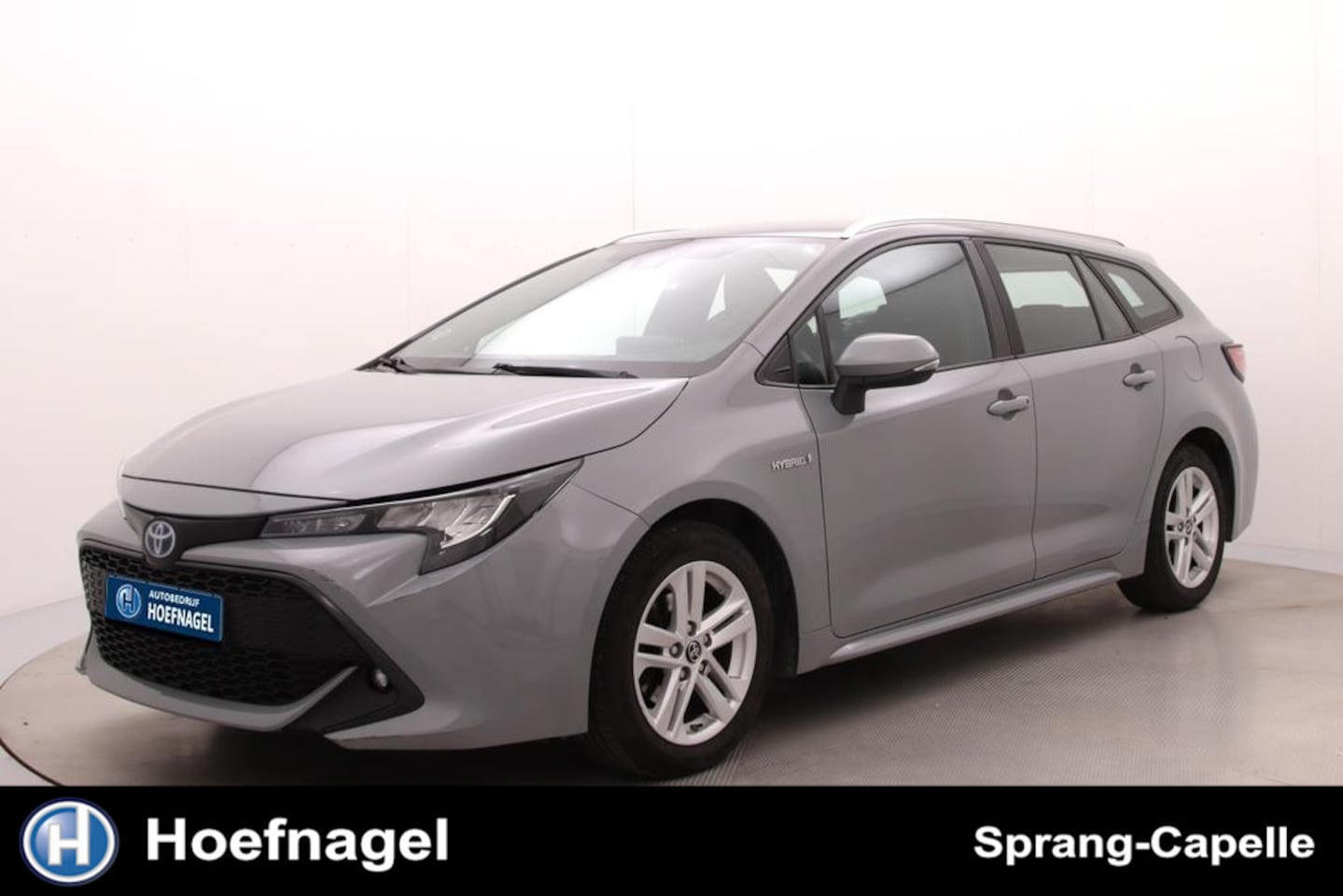 Toyota Corolla Touring Sports - 1.8 Hybrid Comfort | Trekhaak | AdaptiveCruise | Camera | HeadUp Display | CarPlay | Stoel - AutoWereld.nl